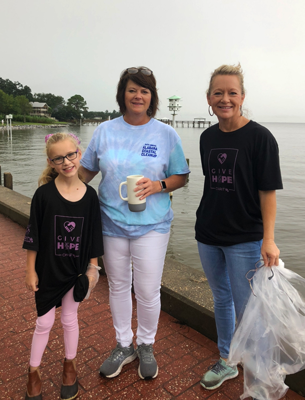 Holin Saucer, Mayor Sherry Sullivan, and Tonya Saucer